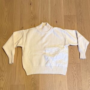Jil Sander Cream Turtleneck Sweater with Floral Accent